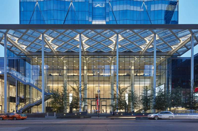 Glass and Steel Atrium Walls with Steel Bow Trusses | Architecturally Exposed Steel
