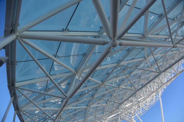 Larger Grid Spaceframe Canopy with Translucent Point supported Glass Shade and Shelter